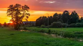 Zachód słońca nad rzeką Gołdapa w Baniach Mazurskich, lipiec 2025 r. - zdjęcie 21