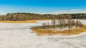 Jezioro Jędzelewo i Stare Juchy z lotu ptaka w zimowej scenerii, luty 2026 r. - zdjęcie 23