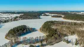 Wieś Sucholaski przy jeziorze Wydmińskim z zimowego lotu ptaka, luty 2026 r. - zdjęcie 38