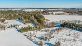 Wieś Sucholaski przy jeziorze Wydmińskim z zimowego lotu ptaka, luty 2026 r. - zdjęcie 21