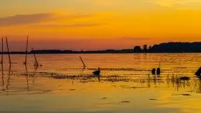 Zachód słońca, widok z wody na jezioro Święcajty - zdjęcie 11