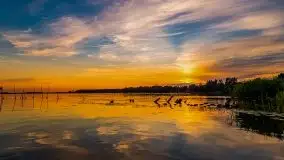 Zachód słońca, widok z wody na jezioro Święcajty - zdjęcie 10