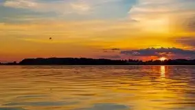 Zachód słońca, widok z wody na jezioro Święcajty - zdjęcie 23