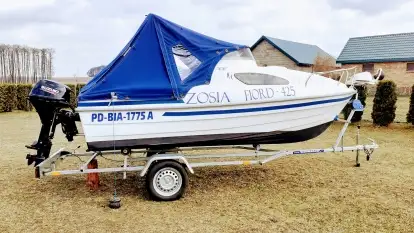 Łódka kabinowa 4,25 z silnikiem Suzuki 20 KM - zdjęcie 13