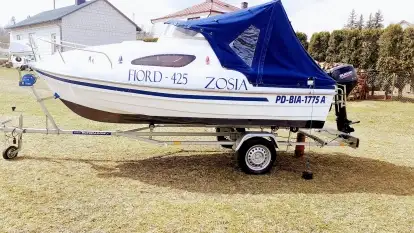 Łódka kabinowa 4,25 z silnikiem Suzuki 20 KM - zdjęcie 12