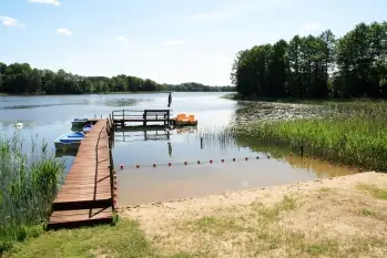 Sprzedam działkę siedliskową na Mazurach z bezpośrednim dostępem do jeziora o pow. 9689 m kw. - zdjęcie 4