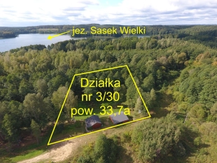 Urokliwa działka na Mazurach z domkiem letniskowym - zdjęcie 1