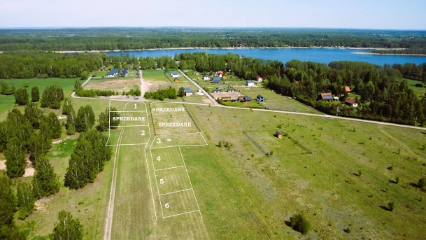 Pilchy -DZIAŁKI REKREACYJNE NAD JEZIOREM ROŚ warunki zabudowy budynek 66,75 m² pow zabudowy