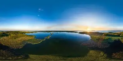 Zachód słońca nad jeziorem Kirsajty